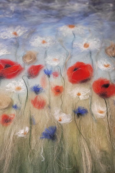 Artistic depiction of flowers with a focus on red and blue colors.