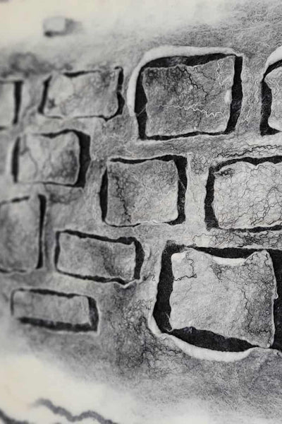 Close-up of a stone wall with rectangular stones