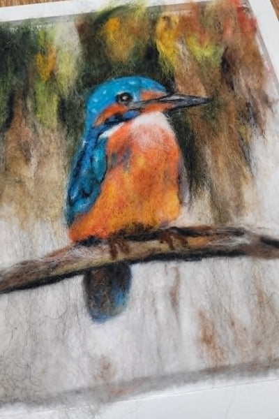 Colorful bird painting on a textured surface
