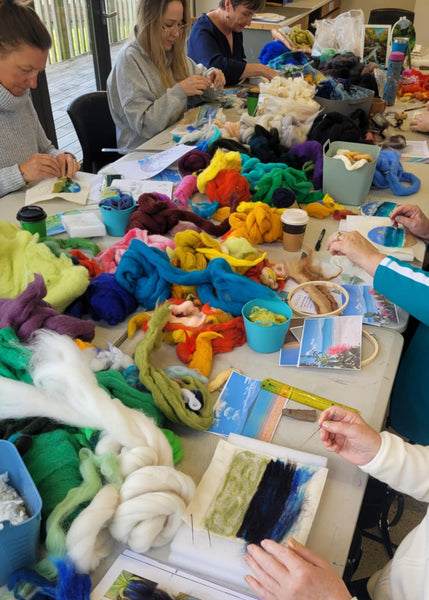 Workshop Vesu is working on craft projects with colourful wool.
