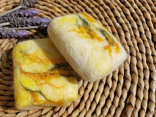 Wool Soap kowhai, covered felted merino wool. Gentle exfoliator skin and body.